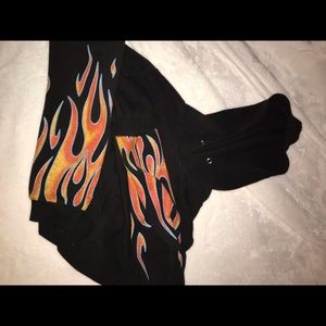 (sideways) lightly worn, the flames cracked.